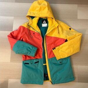 Aperture Raincoat in Yellow, Red, and Green